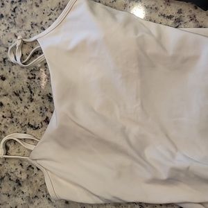 A ton of tanks, various colors, all size small